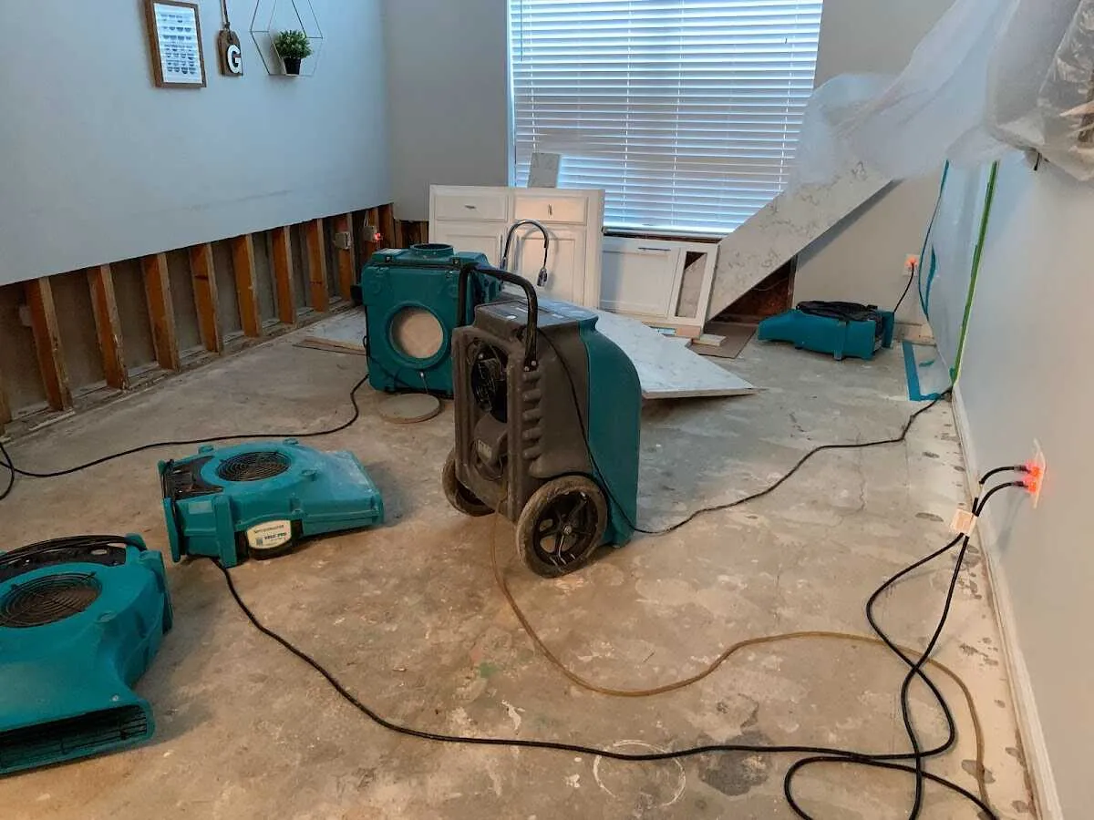 Dehumidifier in flood-cut room for Water Damage Restoration in La Presa